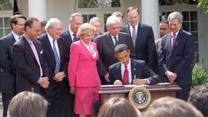 Obama Signing the Credit Card Act of 2009