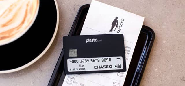 Image of Plastc Card on restaurant payment tray