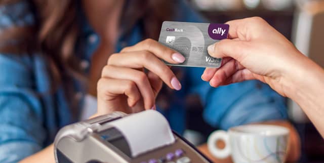 Photo of a Woman Using the Ally CashBack Credit Card Photo of a Woman Using the Ally CashBack Credit Card