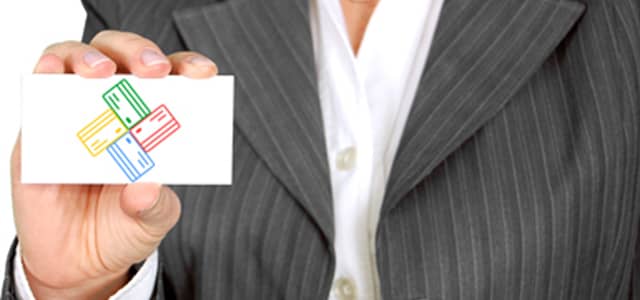 Photo of a business woman with card