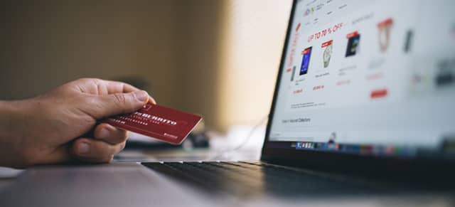Photo of credit card and online shopping