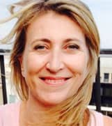 Headshot of Alexandra Origet du Cluzeau, Global PR Director at HomeExchange