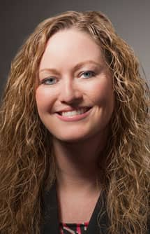 Headshot of Carrie Wilkie, SVP of Standards Management at GS1