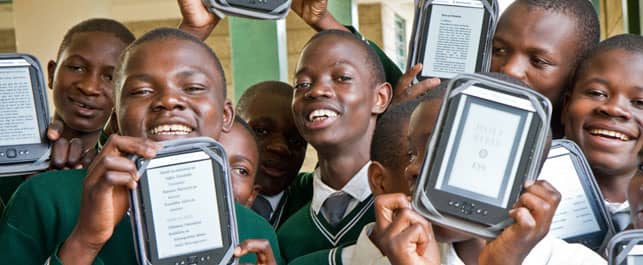 A Photo of Students Holding E-Reader Devices