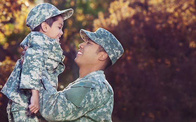 Photo of a veteran with child