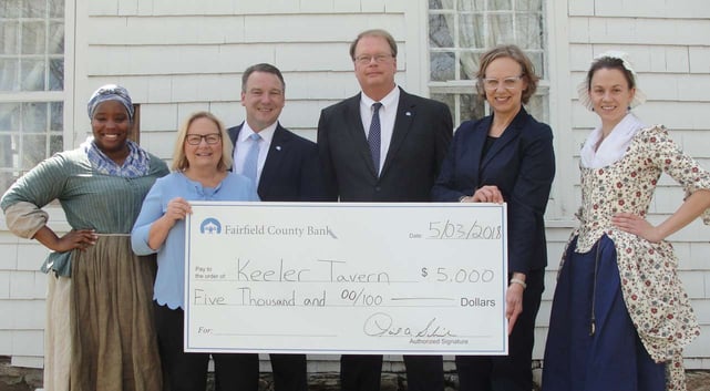 Photo of Fairfield County Bank executives with Keeler Tavern Museum workers