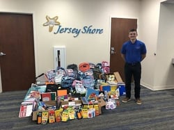 Jersey Shore Federal Credit Union's Garrett Garcia pictured with 2018 Tools for Schools Donations