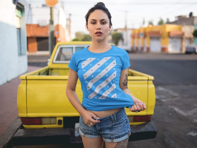 Photo of woman wearing ICONSPEAK shirt