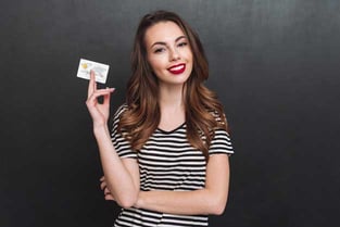 Woman Holding Credit Card