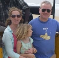 Eileen Gunn and Rich Gunn with Their Daughter