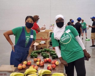 Photo of YMCA workers distributing food