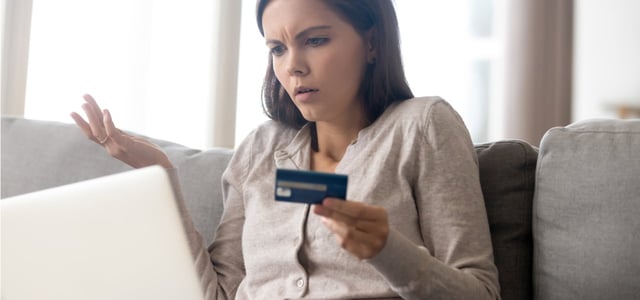 Woman holding a credit card