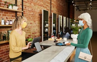 Cashier and Customer Using Square Products