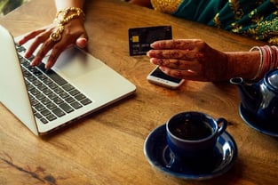 Woman Holding Credit Card