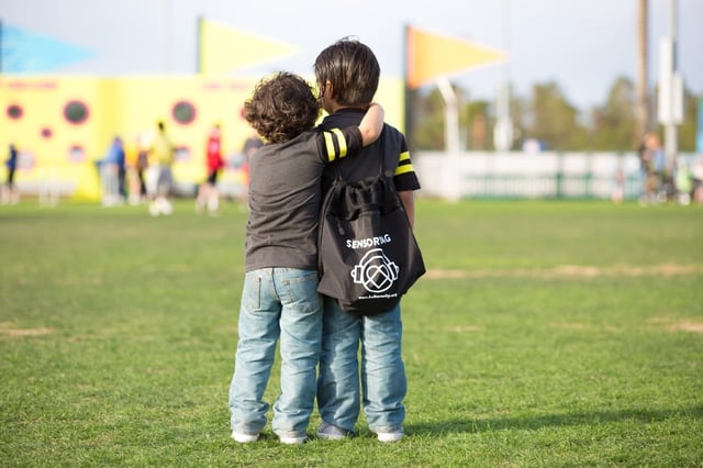 A photo of two boys at a KultureFit certified event.