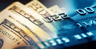 Should I Use My Savings to Pay Off Card Debt?