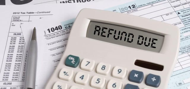 Tax Forms with Calculator that spells out REFUND DUE