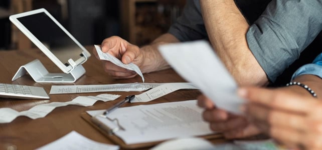 Photo of business owners doing their taxes
