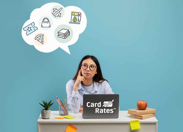 Young woman on a laptop, considering purchases, thought bubble concept