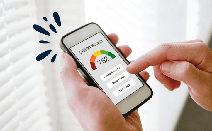 Image of person holding a phone and using credit monitoring services Image of person holding a phone and using credit monitoring services