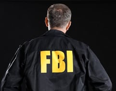 person in fbi jacket