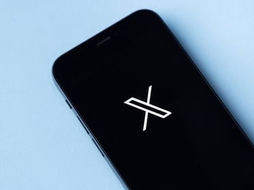 X logo on phone X logo on phone