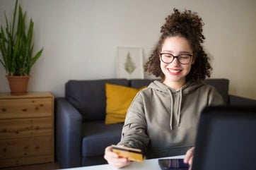 Photo of a Gen Z credit card holder Photo of a Gen Z credit card holder