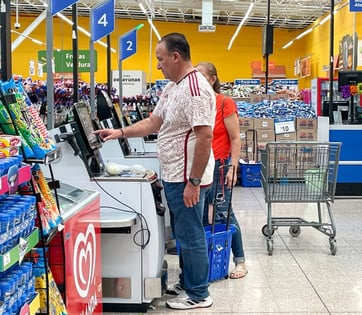 shoppers in line at self-serve lane