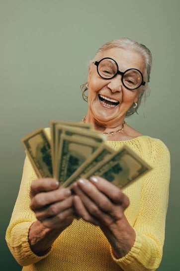 senior holding cash