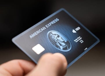 hand holding Amex card