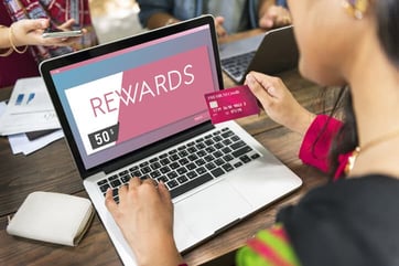 cardholder accessing rewards on laptop cardholder accessing rewards on laptop