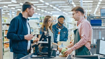 shoppers in checkout line shoppers in checkout line
