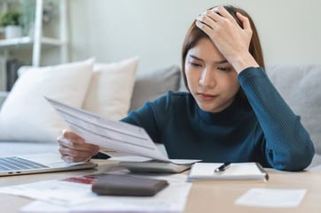 person reviewing credit card statement person reviewing credit card statement