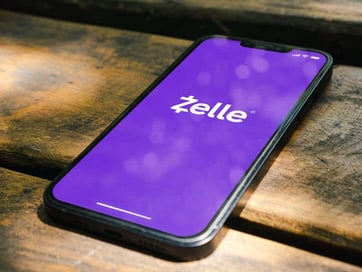 Phone displaying Zelle Phone displaying Zelle