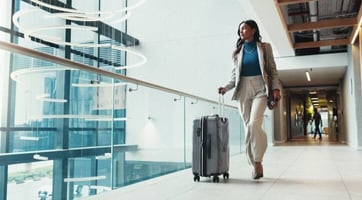 a business woman traveling with a suitcase graphic a business woman traveling with a suitcase graphic
