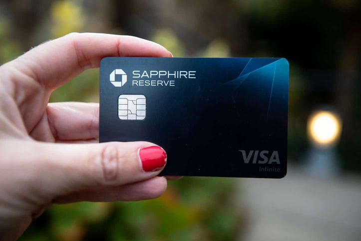 Hand holding Sapphire Reserve card Hand holding Sapphire Reserve card