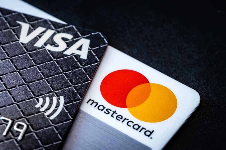 Corner of Mastercard and Visa cards Corner of Mastercard and Visa cards